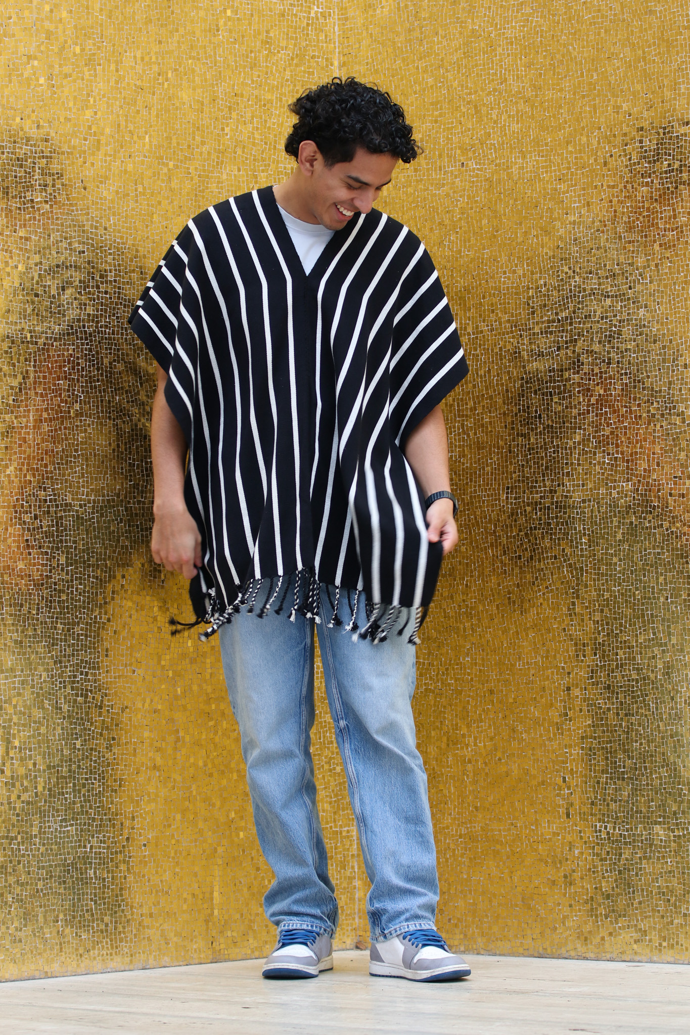 BLACK PONCHO WITH WHITE STRIPES