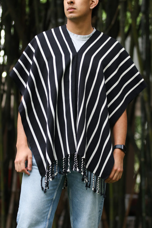 BLACK PONCHO WITH WHITE STRIPES