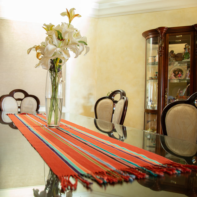 ORANGE TABLE RUNNER WITH COLORED STRIPES