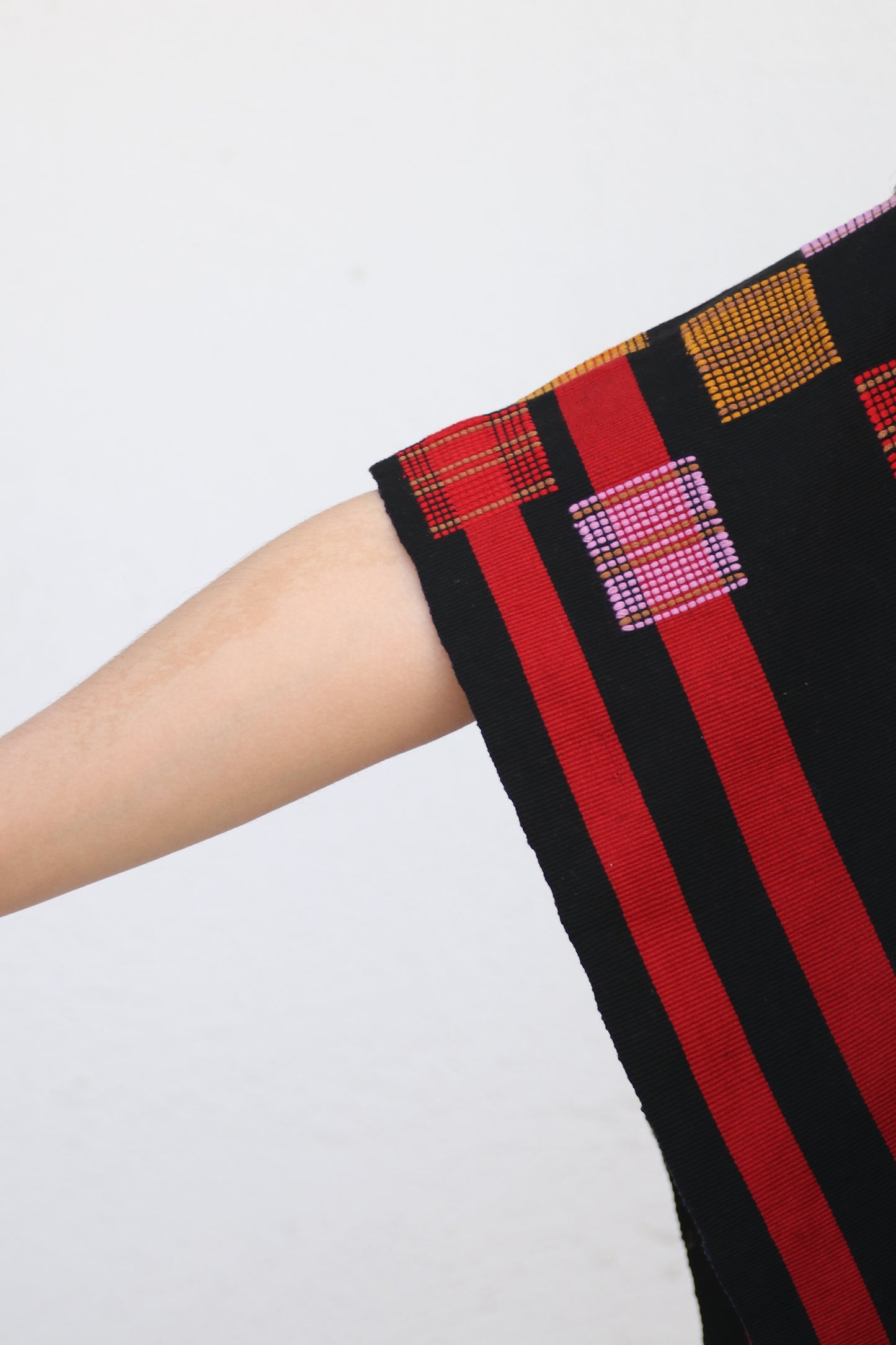 BLACK PONCHO WITH RED STRIPES