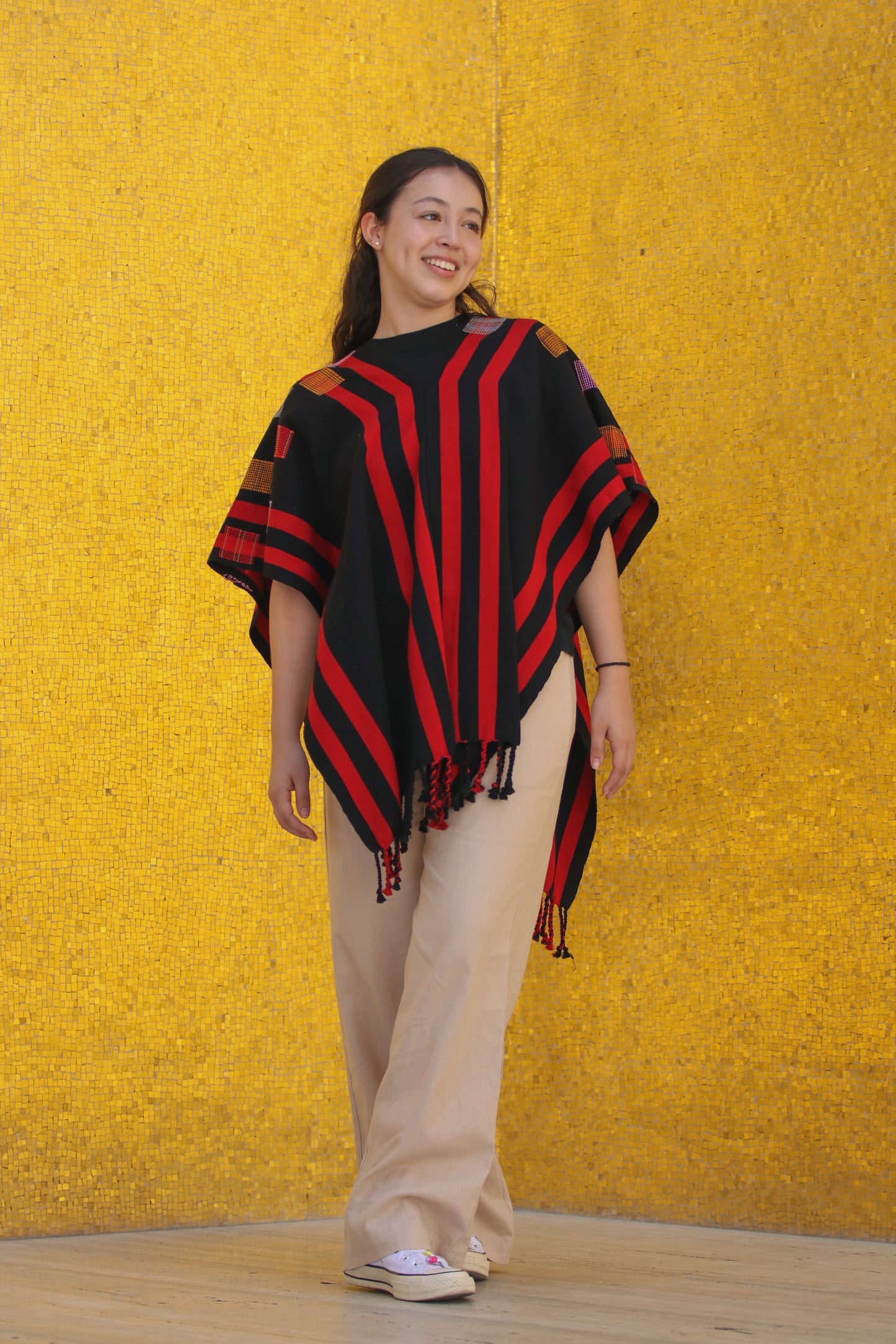 BLACK PONCHO WITH RED STRIPES