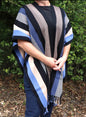 PONCHO DE RAYAS OBSCURAS Y AZULES