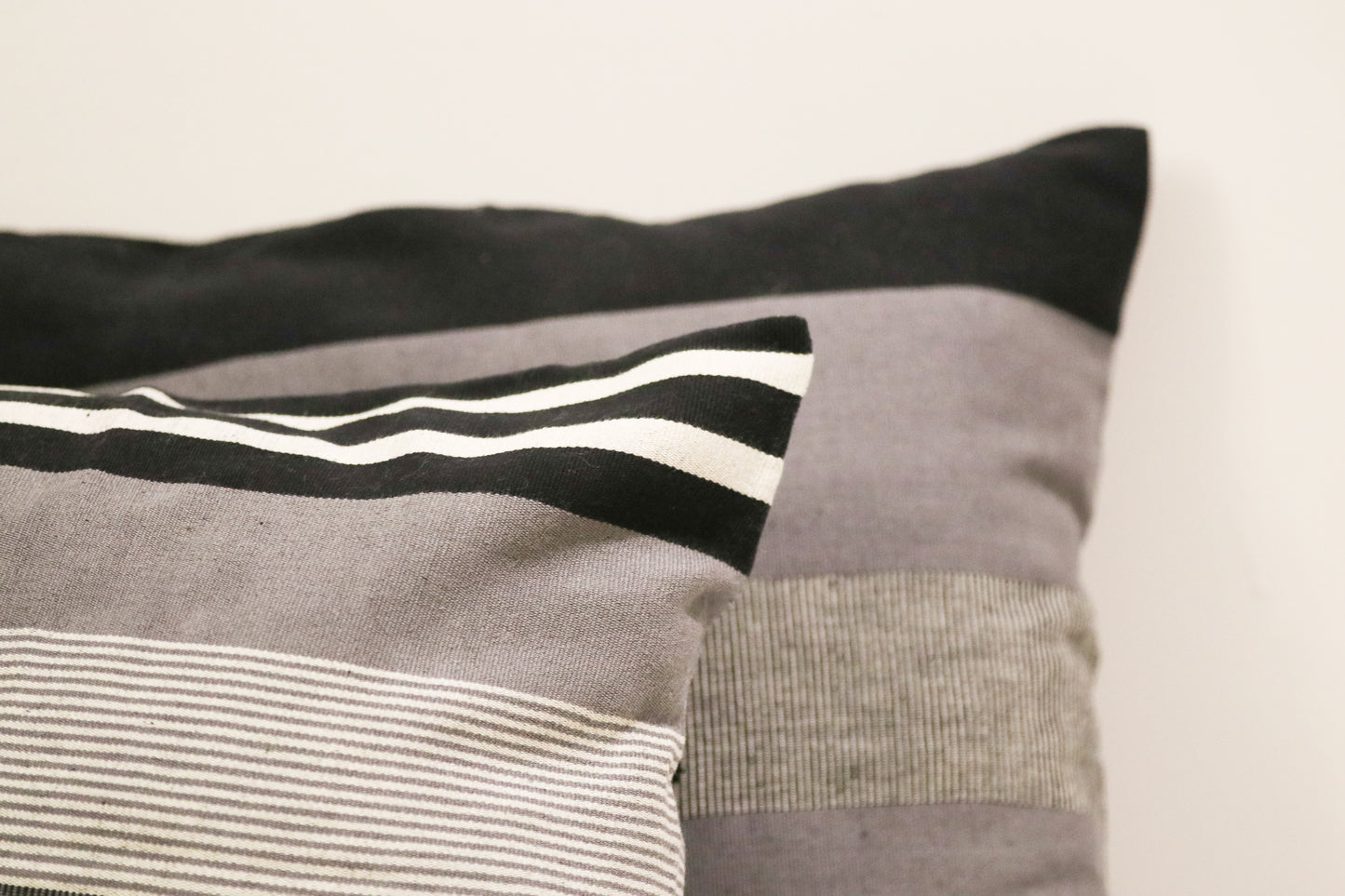 CUSHION COVERS: WHITE WITH GREY STRIPES AND GREY WITH BLACK STRIPES